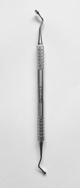 Przenośnik / upychadło do biomateriału